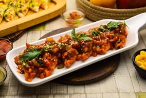 Jain Specials Pan Fried Momos In Sweet Basil Sauce [6 pieces]