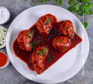 Chicken Pan Fried Momo In Schezwan Sauce