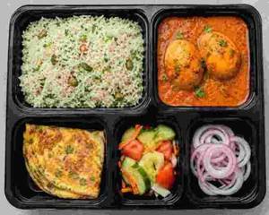 Egg Lunch Box (Herbed Rice + Egg Curry + Omelette + Veg Salad )