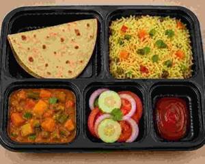 Quick Veg Lunch-(1chapati +Flavoured Rice - Veg Gravy+salad + Sauce)