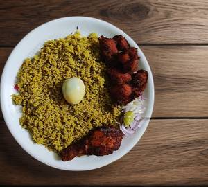 Biryani with kebab and coke