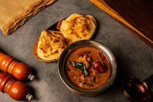 Parotta With Chicken Curry