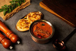 Parotta With Fish Curry