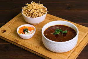 Veg Manchow Soup [500 Ml] [served With Fried Noodles]