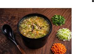 Manchow In White Twist Soup Veg
