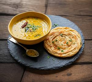 Patla Dal + Lachha Paratha (1 Piece)