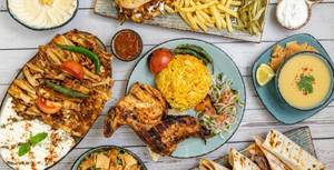 Half Grill Chicken + Half Alfham Chicken + 4 Shawarma Roll + French fries