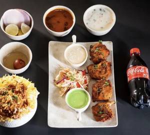 2 Biriyani Rice + 4Pc Chicken Kabab +2 Soft Drinks