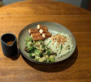 Udon Noodles Bowl With Butter Tossed Veggies & Sesame Crustef Tofu