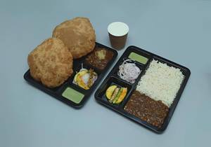 Chole Chawal + Puri Choley + Lassi (salted)