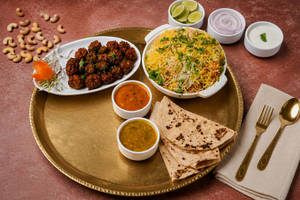 Veg Biryani + Manchurian+3 Pulka Curry