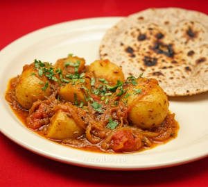 Aalu Dum/ Do Pyaja + Tandoori Roti (1 piece)