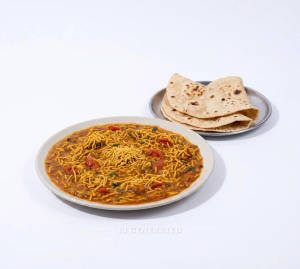 Sev Tamatar + Roti Tawa Plain (2 pieces)
