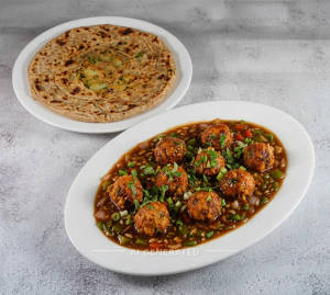 Veg Manchurian Gravy + Aloo Paratha (1 Piece)