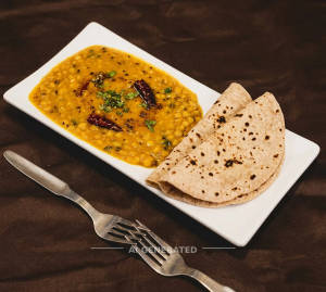Tadka Dal + Tava Roti (2 Pieces)