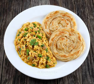 Egg Kalakki + Parotta (2 pieces)