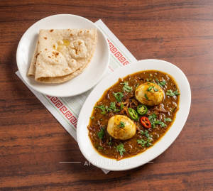 Egg Cury + Roti (2 pieces)