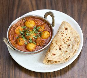 Dum Aloo Banarasi + Plain Tawa Roti (2 Pieces)