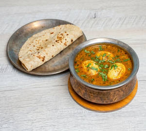 Egg Curry + Tawa Roti (1 Piece)