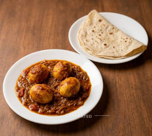 Anda Curry + Rumali Roti (1 Piece)
