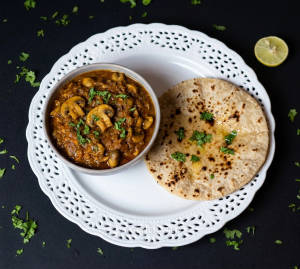 Mashroom Masala + Roti Tava (1 Piece)