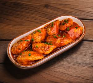 Paneer Schezwan Gravy Momos