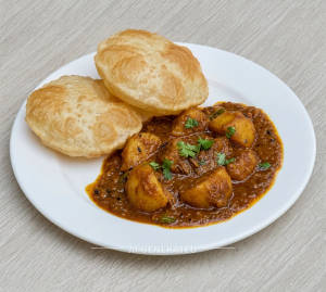 Aloo Dum + Luchi (2 Pieces)