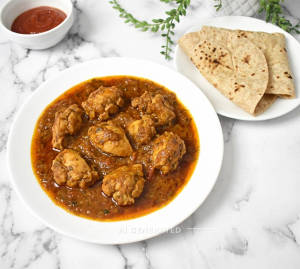 Chicken Curry + Plain Roti (2 pieces)