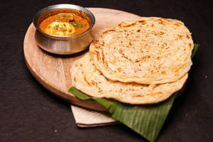 Kerala Parotta + Egg Curry Combo