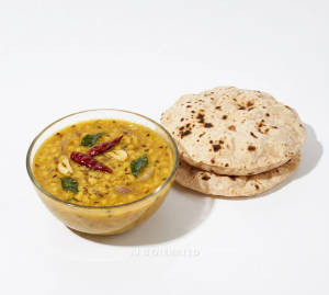 Dal Tadka + Tawa Plain Roti (2 pieces)