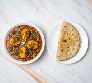 Egg Curry + Butter Roti (1 Piece)   