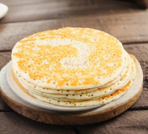 Kal Dosai (2 Pieces) with fish kolambu