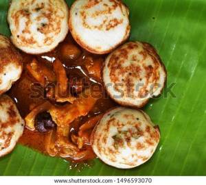 Kuzhi Paniyaram ( 7 Pieces) With Fish Curry