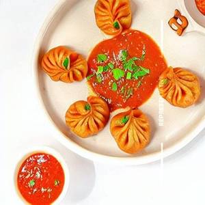 Paneer  Achari Gravy Momos
