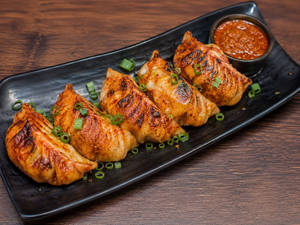 Pan Fried Schezwan Paneer Momos