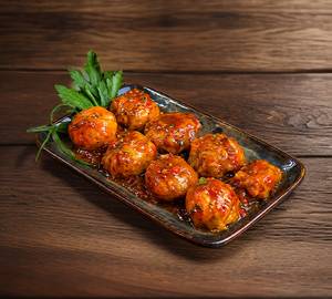 Veg Manchurian Gravy Momos