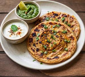 Aloo Paratha With Curd And Green Chutney