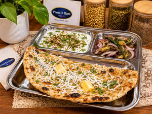 Paneer Paratha With Raita & Chuteny Pyaj (1 Pc.)