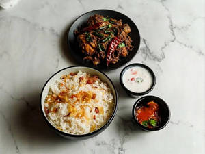 Ghee Rice+ Chicken Roast(2 Pieces)+ Raitha+ Pickle Meal