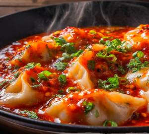 Schezwan chicken momo [8 pieces]