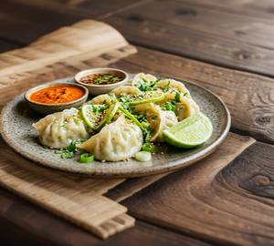 Ghondhoraj chicken momo [8 pieces]