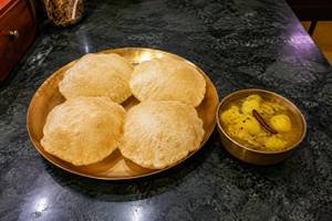 Luchi And Aloor Tarkari