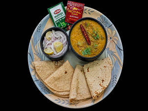 Dal Fry Tadka With 4 Butter Tawa Roti