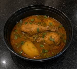 Chicken curry with aloo