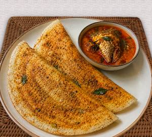 2 Pieces Karuveppilai Ghee Podi Dosai With Fish Curry