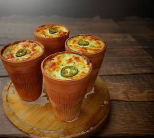 Kulhad Pizza A Cheesy Full Of Veggies Tasty And Mouth Watering Pizza In Desi Kulhad Well Cooked.
