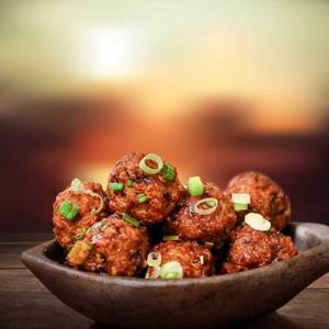 Veg Dumpling In Manchurian Sauce