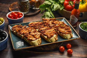 Hummus & Spicy Chicken Brushchetta