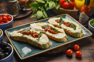 Tomato & Stracciatella Brushchetta