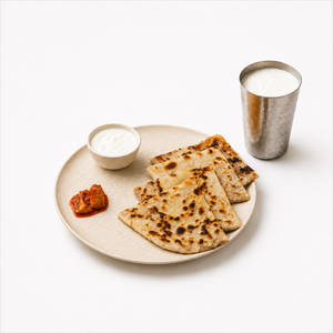 Combo 2 – Stuffed Paratha & Lassi